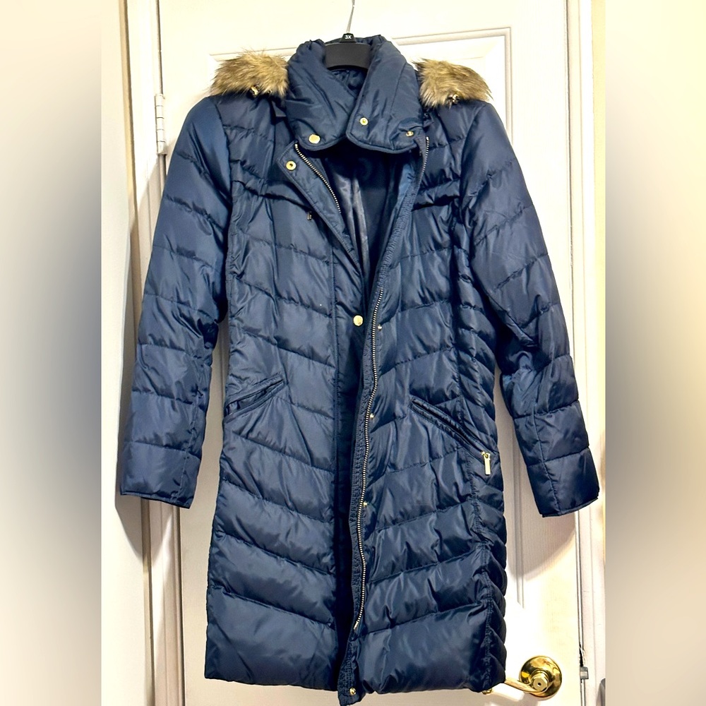 Michael Kors long puffer jacket with faux fur trim hood.